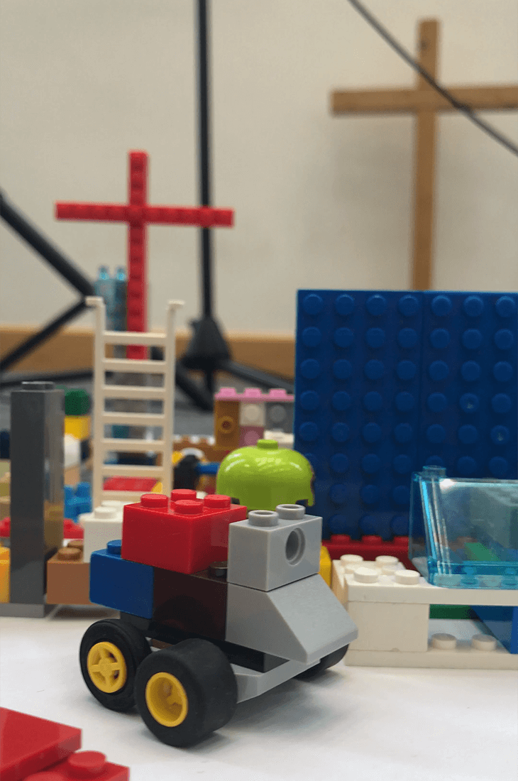 Lego townscape including a cross